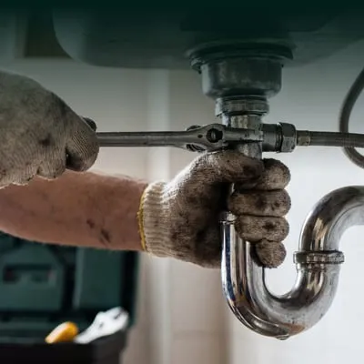 Plumbers service in progress